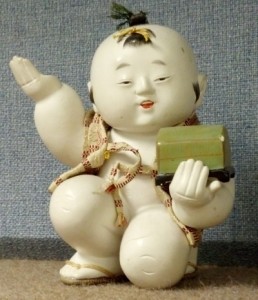 This 20th-c gosho doll is a good example of gofun applied over toso (wood composition).