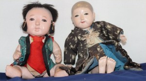 Two play dolls, meant to encourage nurturing, sewing skills, and imaginative play. Late 19th-early 20th century.