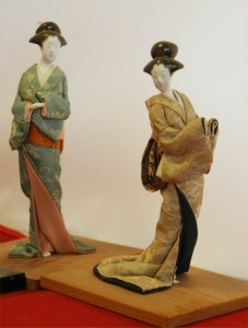 Two small dolls (20th century)representing refined 18th-century courtesans.